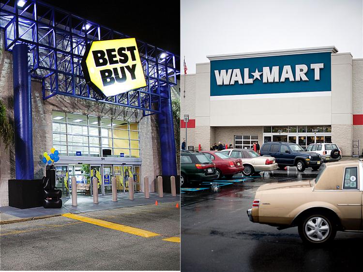Wal-Mart (Jeff Zelevansky/Getty Images) and Best Buy (Matt Stroshane/Getty Images) are offering deals on electronics on Black Friday. ()
