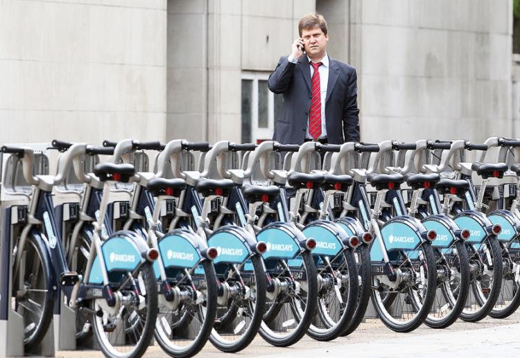 A man looks at a row of new bicycles after the launch of London's first ever cycle hire scheme on July 30 in London England. A similar public bicycle program is being considered in NYC.  (Dan Kitwood/Getty Images)
