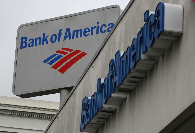 The Bank of America logo is displayed on the side of a Bank of America branch office earlier this year in San Francisco, Calif. Bank of America Corp. is considering reducing its equity stake in asset management firm BlackRock Inc.  (Justin Sullivan/Getty Images)