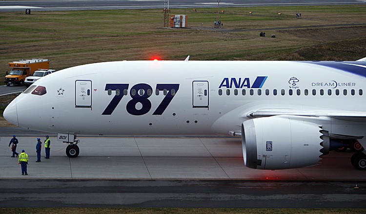 All Nippon Airway's new Boeing 787 prepares to take off from Everett, Wash., bound for Tokyo, Japan on Sept. 27. The first Boeing 787 Dreamliner took off Tuesday for its new home in Japan, an all-new composite passenger plane the U.S. aerospace giant touts as a game changer in the aviation industry. All Nippon Airways, the launch customer for the 787 program, took delivery of the twin-aisle plane on Sunday, more than three years behind schedule due to design and production delays. (Kevin P. Casey/AFP/Getty Images)