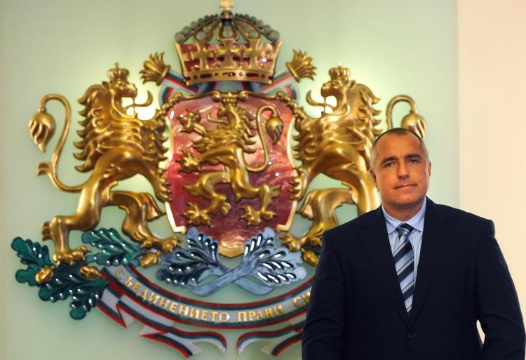 Bulgarian Prime Minister Boyko Borisov poses before the state emblem in Sofia on July 23.  (Dimitar Dilkoff/AFP/GETTY IMAGES )