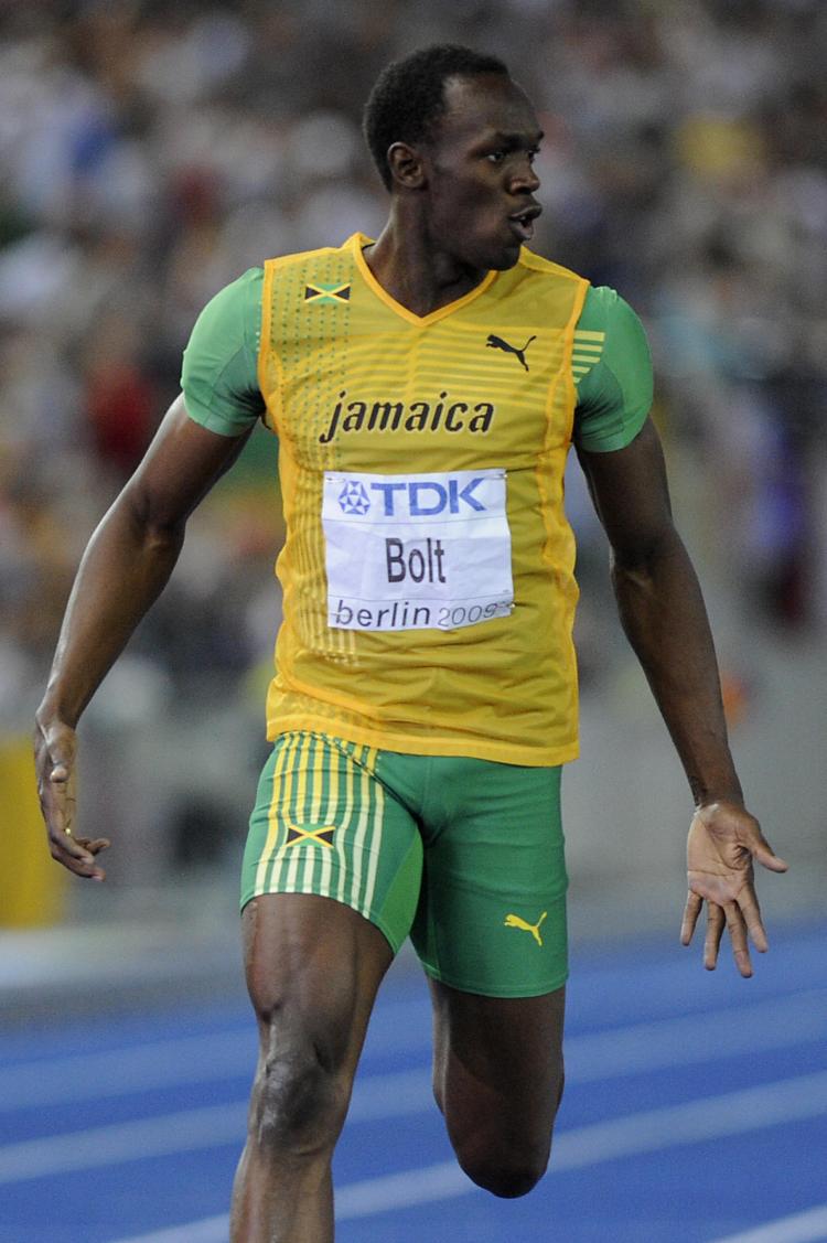 Jamaican Usain Bolt runs the 200 meters in 19.19 seconds. (Olivier Morin/AFP/Getty Images)