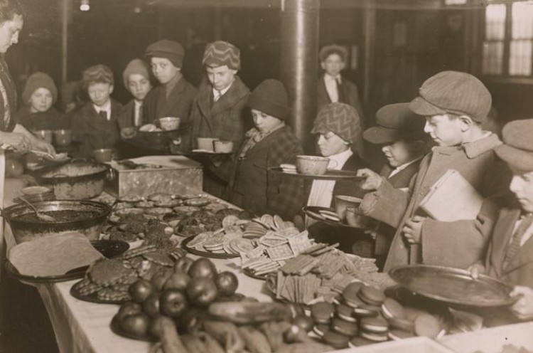 Boys eating school lunch at P.S. 40. Silver gelatin print, 1919