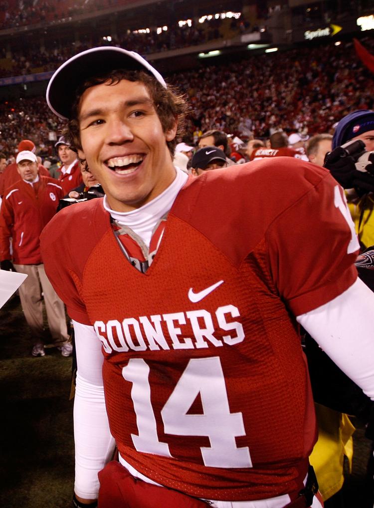 BIG 12 CHAMP: Oklahoma Sooners QB Sam Bradford celebrates after beating Missouri last Saturday. (Jamie Squire/Getty Images)