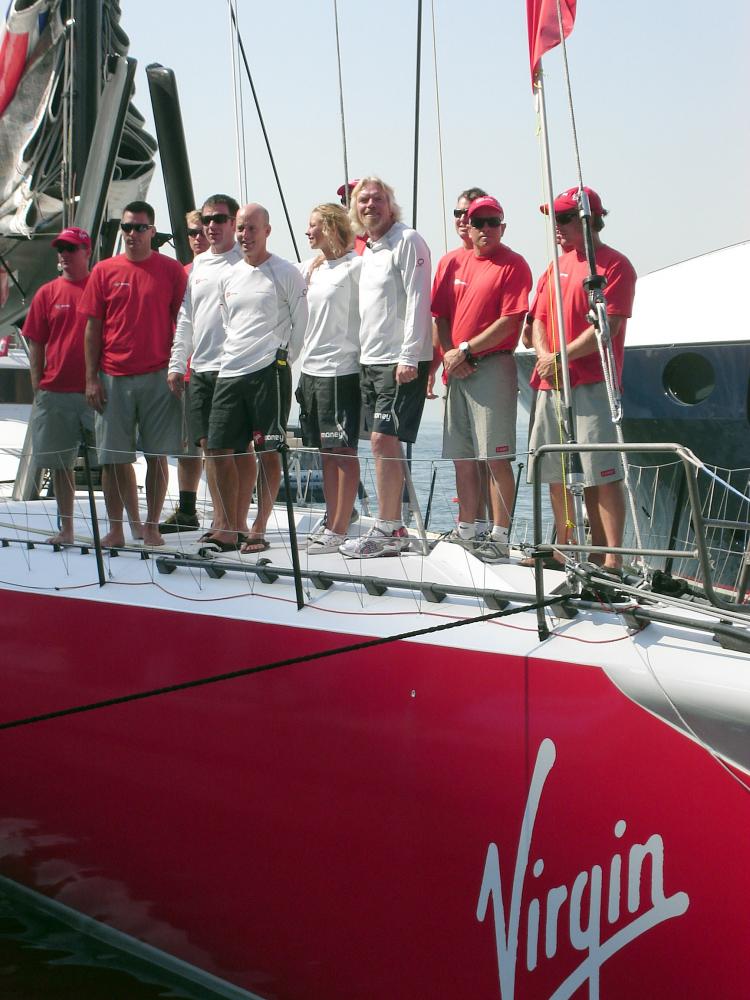 BON VOYAGE: Virgin Group chairman Sir Richard Branson with part of the TeamOrigin sailing crew on board the 99-foot yacht they will sail from New York to England in an attempt to break the world record for fastest crossing of the Atlantic on a boat.  (Christine Lin The Epoch Times)