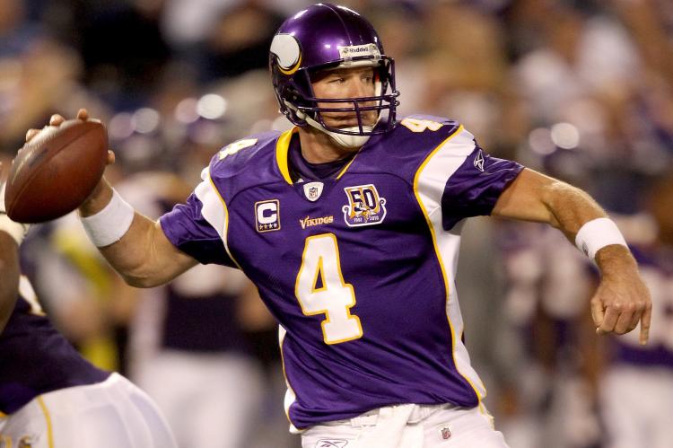 Brett Favre of the Minnesota Vikings looks for an open receiver while playing the Green Bay Packers at the Hubert H. Humphrey Metrodome on November 21, 2010 in Minneapolis, Minnesota.  (Matthew Stockman/Getty Images)