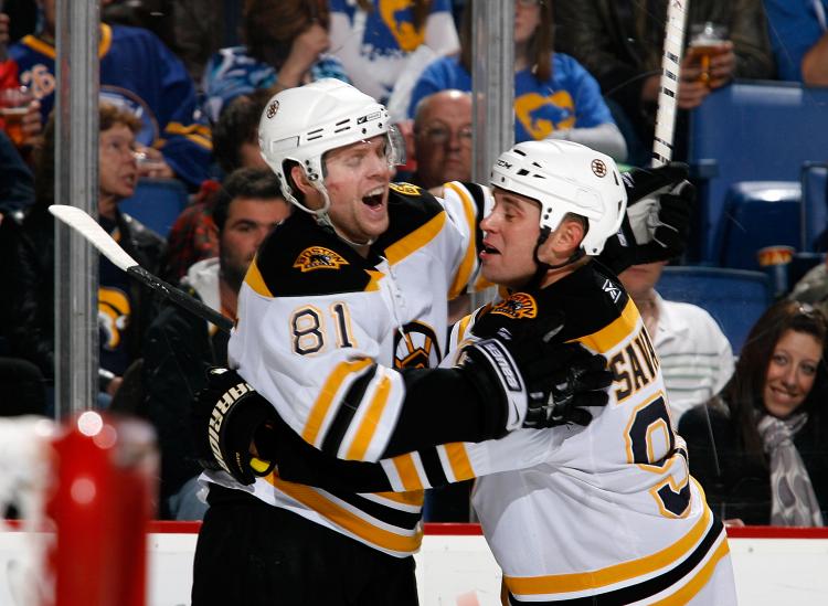 SUCCESS STORY: Phil Kessel #81 and Marc Savard #91 of the Boston Bruins have plenty of reasons to celebrate as the Bruins are the best team in the Eastern Conference. (Rick Stewart/Getty Images)