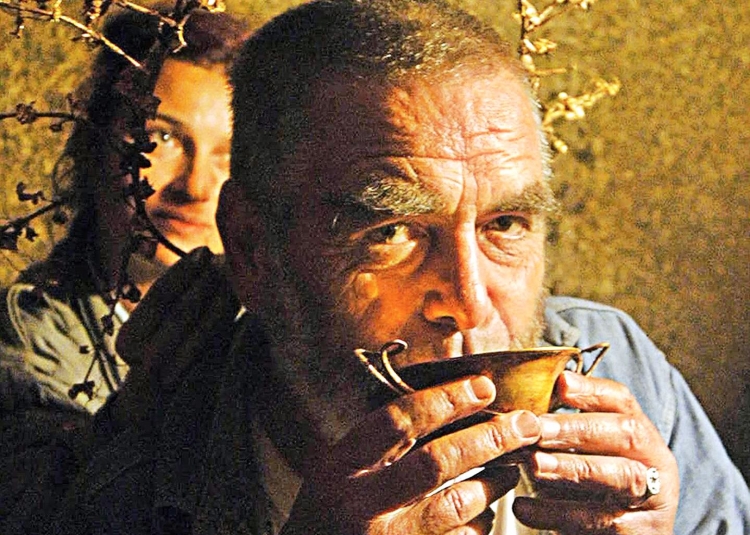 Bulgarian archaeologist, Georgi Kitov, famous for his Thracian expertise, drinks wine from an ancient golden cup in 2004. (Tcvetan Tomchev/AFP/Getty Images)