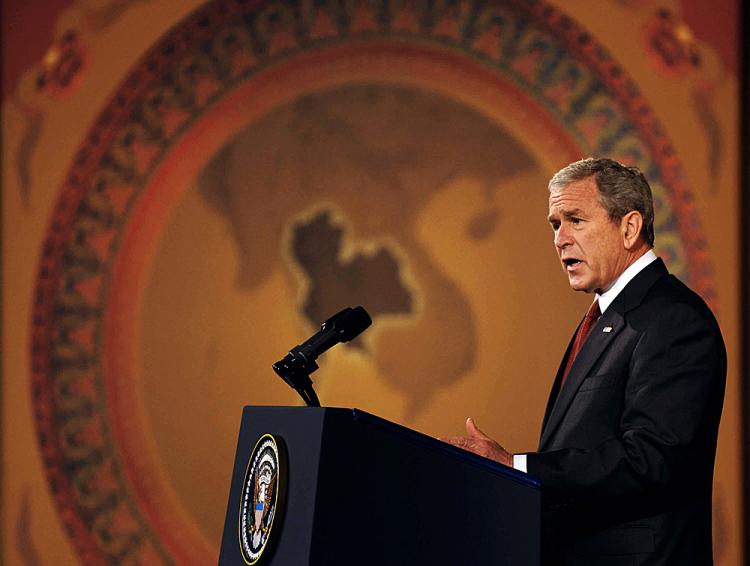 President George W. Bush criticizes the Chinese regimes human rights record in a speech from the Queen Sirikit National Convention Center in Bangkok on August 7, 2008. (Mandel Ngan/AFP/Getty Images)