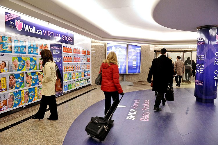 Commuters browse Canada's first virtual store in downtown Toronto