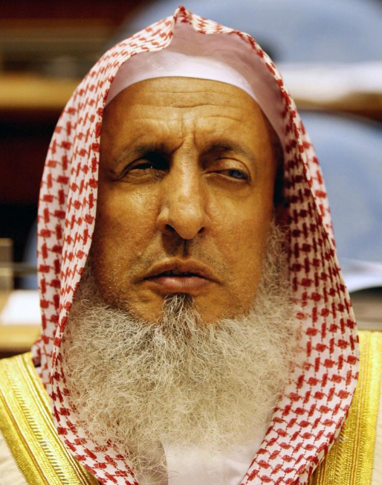 Saudi Grand Mufti Sheikh Abdul Aziz al-Sheikh listens to the speech of Saudi King Abdullah bin Abdul Aziz al-Saud at the Saudi Shura Council in the Saudi capital Riyadh on March 15, 2008. Al-Sheikh, Saudi Arabiaâ��s senior religious authority, says girls as young as 10 are old enough for marriage. In a landmark divorce case, the countryâ��s Human Rights Commission is stepping on behalf of a 12-year-old girl wed to an 80-year-old man last year. (Hassan Ammar/AFP/Getty Images )