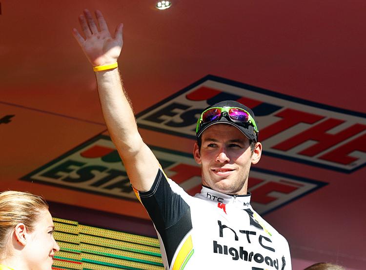 Britain's Mark Cavendish of HTC-Highroad celebrates on the podium after winning the Stage 12 of the 94th Giro dâ��Italia. (Luk Benies/AFP/Getty Images)