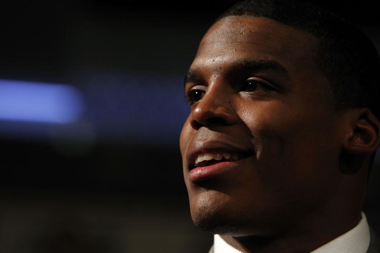 Cam Newton, quarterback of the Auburn Tigers, was named an AP All-American days after being awarded the Heisman Trophy. (Jeff Zelevansky/Getty Images)