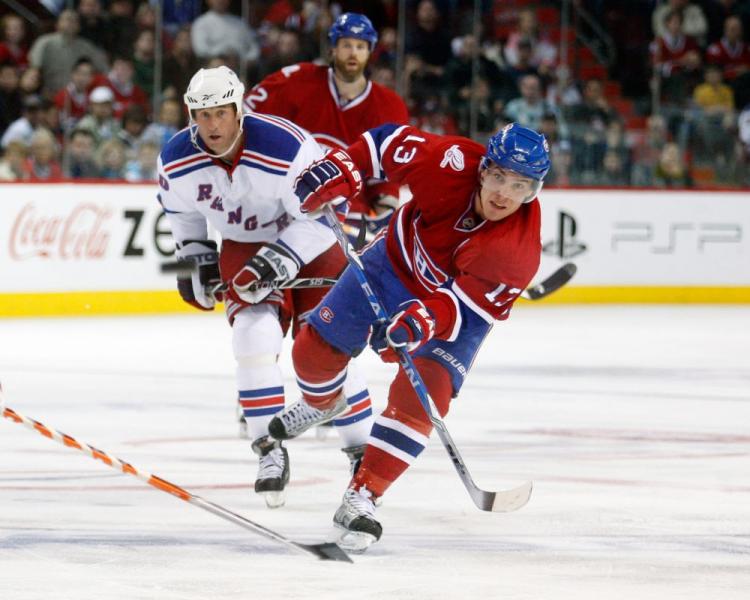 Mike Cammalleri fires a shot at Henrik Lundqvist during Saturday night's action at the Bell Centre in Montreal.  (Richard Wolowicz/Getty Images)