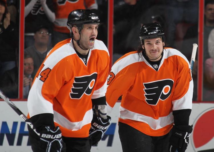 Flyers tough guy Dan Carcillo (right) went after Rangers top scorer Marian Gaborik on Thursday night. (Bruce Bennett/Getty Images)