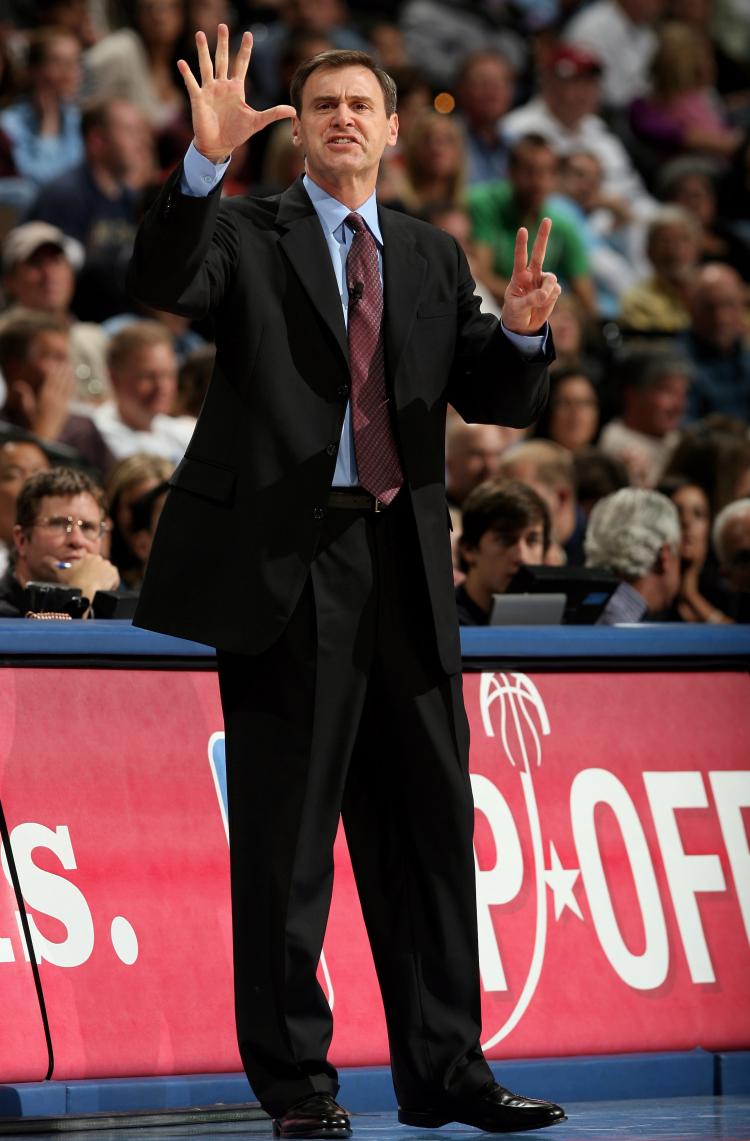 NBA COACH: Rick Carlisle of the Dallas Mavericks actively gives instructions to his team.  (Doug Pensinger/Getty Images)