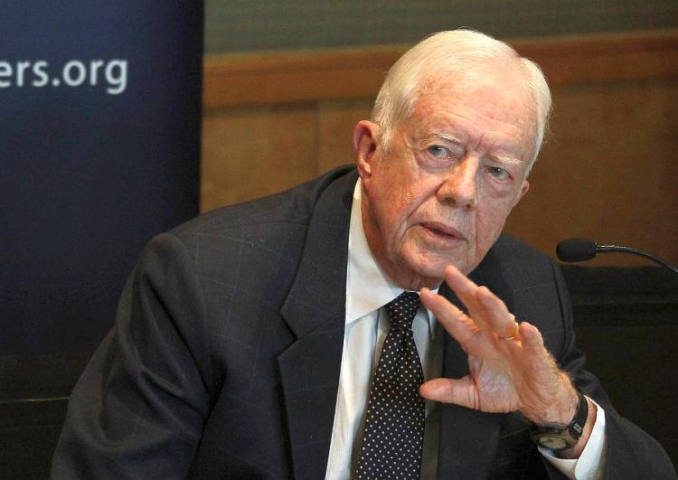 Former U.S. president Jimmy Carter, a member of the Elders group, speaks during a joint press conference with other members of the group in Damascus on October 19, 2010. (Louai Beshara/AFP/Getty Images)