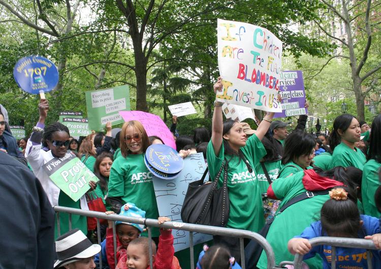 DAY CARE CRUNCH: Officials, parents, and children marched from Bowling Green to City Hall on Wednesday to protest the proposed closing of 15 day care centers in Manhattan, Queens, and Brooklyn. (The Epoch Times)