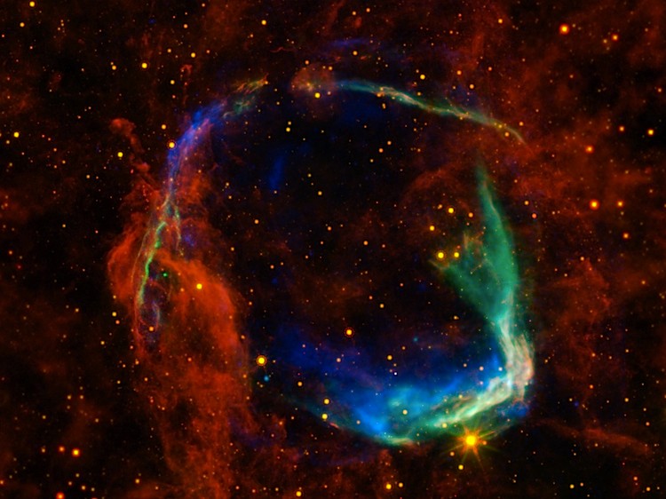 Multi-wavelength view of RCW 86 with data from four different space telescopes showing all that remains of the oldest documented example of a supernova witnessed by the Chinese in 185 A.D. (NASA/ESA/JPL-Caltech/UCLA/CXC/SAO)
