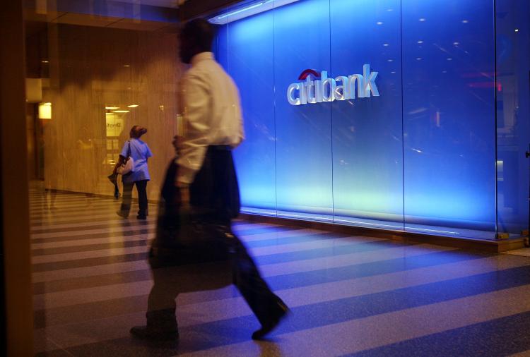A pedestrian walks by Citibank on July 17, 2009 in New York, New York. (Spencer Platt/Getty Images)
