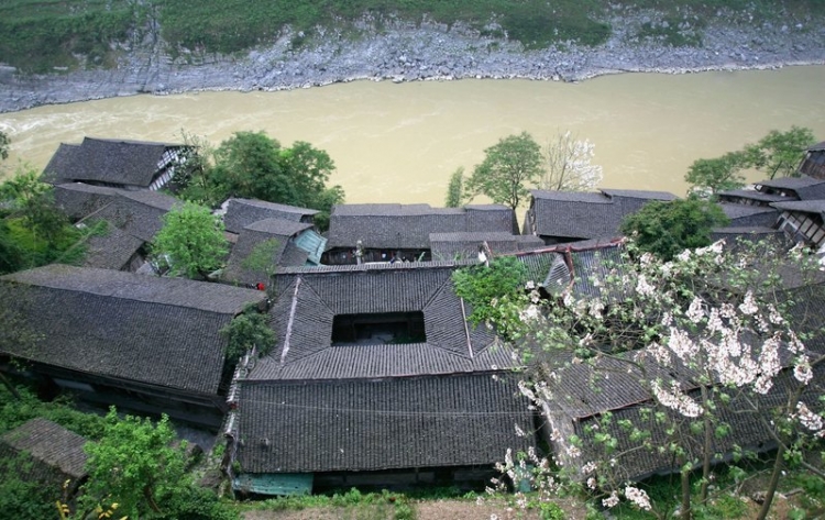 Boats still travel down the Wujiang River at the foot of Gongtan City. (China Photos/Getty Images)