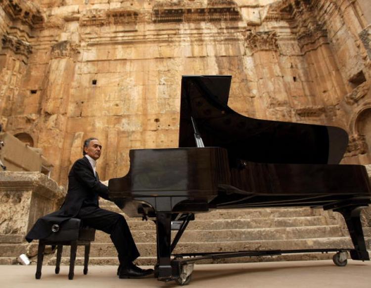 Abdel Rahman El Bacha as he prepares for his performance on the last night of the international music festival at the historic Roman ruins at Baalbek in Lebanon's Bekaa Valley. A France-based Lebanese classical pianist and composer, Bacha is considered to be among the leading classical pianists to have emerged from the Middle East and has won a number of international prizes. (Anwar Amro/AFP/Getty Images)