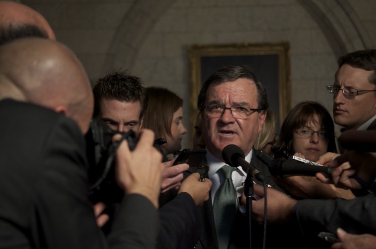 Finance Minister Jim Flaherty told reporters on Parliament Hill Wednesday that the government was prepared to take pragmatic measures if the Canadian economy takes a hit.  (Matthew Little/The Epoch Times)