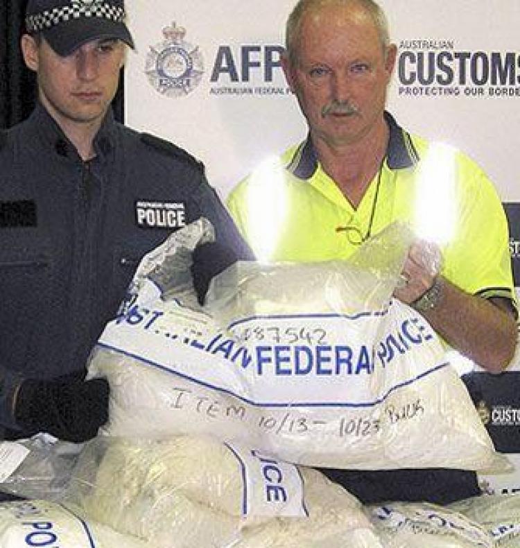 Police display a portion of the 250kg of cocaine, valued at approximately $80 million USD, confiscated the biggest bust in the history of New South Wales. (Internet Screenshot)