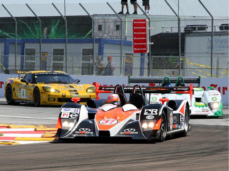Olivier Beretta in the Corvette Racing GT1 chases Ben Devlin in the B-K Motorsports Lola-Mazda and the Clint Field in the Intersport Racing Lola-AER aroung Turn One at St. Petersburg, 2008. (Sherwood Liu/The Epoch Times) Olivier Beretta in the Corvette Racing GT1 chases Ben Devlin in the B-K Motorsports Lola-Mazda and the Clint Field in the Intersport Racing Lola-AER aroung Turn One at St. Petersburg, 2008. (Sherwood Liu/The Epoch Times)