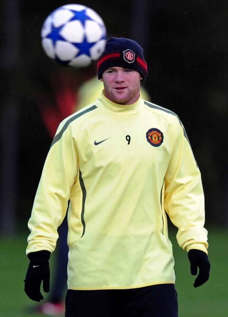 Wayne Rooney in a team training session at the club's Carrington training complex, in Manchester, north-west England on Oct. 19, 2010. (Paul Ellis/AFP/Getty Images)
