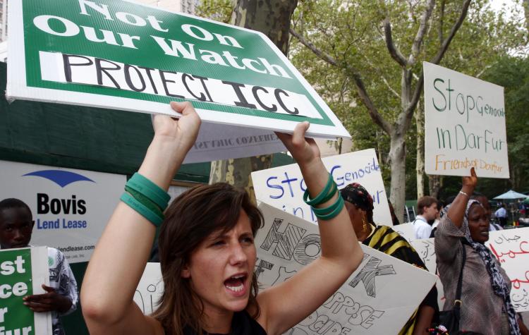 IN SUPPORT OF DAFUR: Advocates at the U.N. headquarters in New York shout in praise of the ICC's stance on seeking justice for Darfuri's (Mimi Li The Epoch Times)