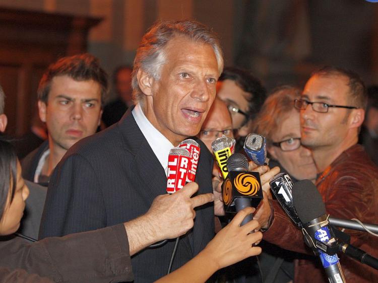 Former French Prime Minister Dominique de Villepin (C) adresses journalists at a Paris courthouse, at the end of the so-called 'Clearstream affair' trial last Friday. (Patrick Kovarik/AFP/Getty Images )