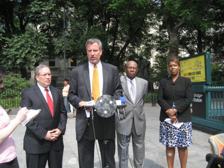 Council Member Bill de Blasio (second from left) speaks about the 'archaic' rules that forced his name off the ballot for New York public advocate. Manhattan Borough President Scott Stringer (L), Congressman Ed Towns (second from right), and Council Member Tish James (R) join de Blasio in support. (Vicky Jiang/The Epoch Times)