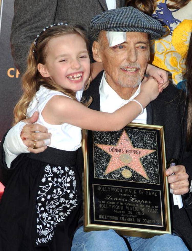 Dennis Hopper poses with his daughter Galen after being honored with a star on the Hollywood Walk of Fame in Hollywood in March of this year. Hopper succumbed to cancer today. He starred in such cinematic classics as 'Easy Rider' and 'Apocalypse Now.' (Gabriel Bouys/AFP/Getty Images)