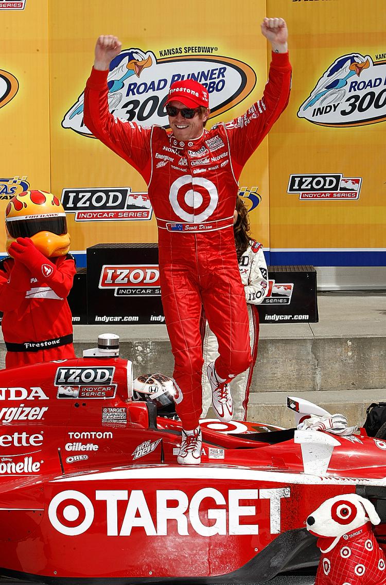 Scott Dixon celebrates winning the Indy Car Series Road Runner Turbo Indy 300 at Kansas Speedway in Kansas City, Kansas. (Jonathan Ferrey/Getty Images)