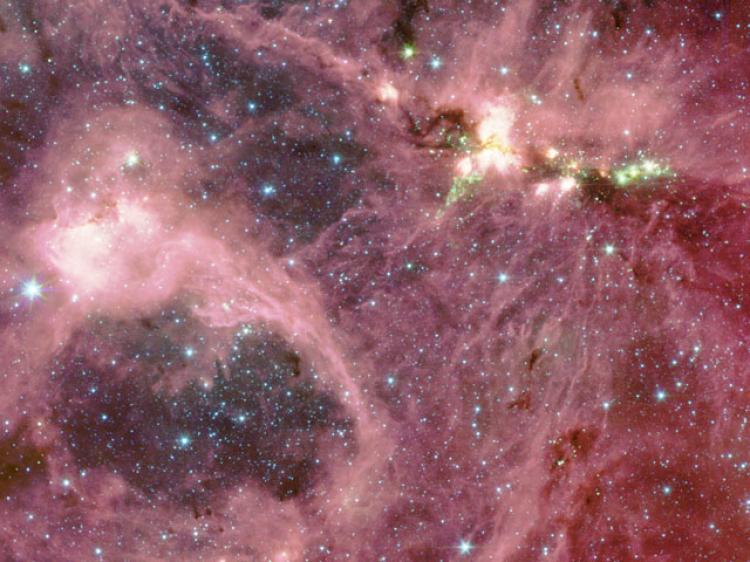 STAR BIRTH: Astronomers caught a glimpse of a future star just as it is being born out of the surrounding gas and dust, in a star-forming region similar to the one pictured above. (A. Marston (ESTEC/ESA) et al., JPL, Caltech, NASA )