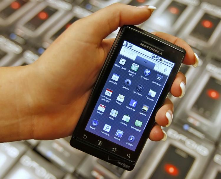 A Motorola Droid smart phone running Android. Strong sales of the Droid smartphone pushed Motorola's third-quarter revenues to a robust $5.8 billion. (George Frey/Getty Images)
