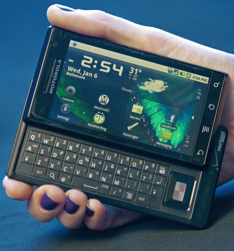 In this file photo, a Motorola Droid smartphone handset is seen earlier this year. Software giant Microsoft is suing Motorola on patent infringement related to e-mail and synchronization. (Paul J. Richards/AFP/Getty Images)