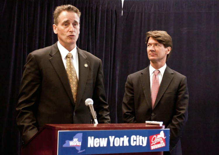 STATE SUPPORT: Lt. Gov. Robert Duffy (L) and President and CEO of Empire State Development Kenneth Adams (R) report on the progress of the first meeting held by the new regional economic council in Manhattan on Wednesday morning. (Tara MacIsaac/Epoch Times Staff)