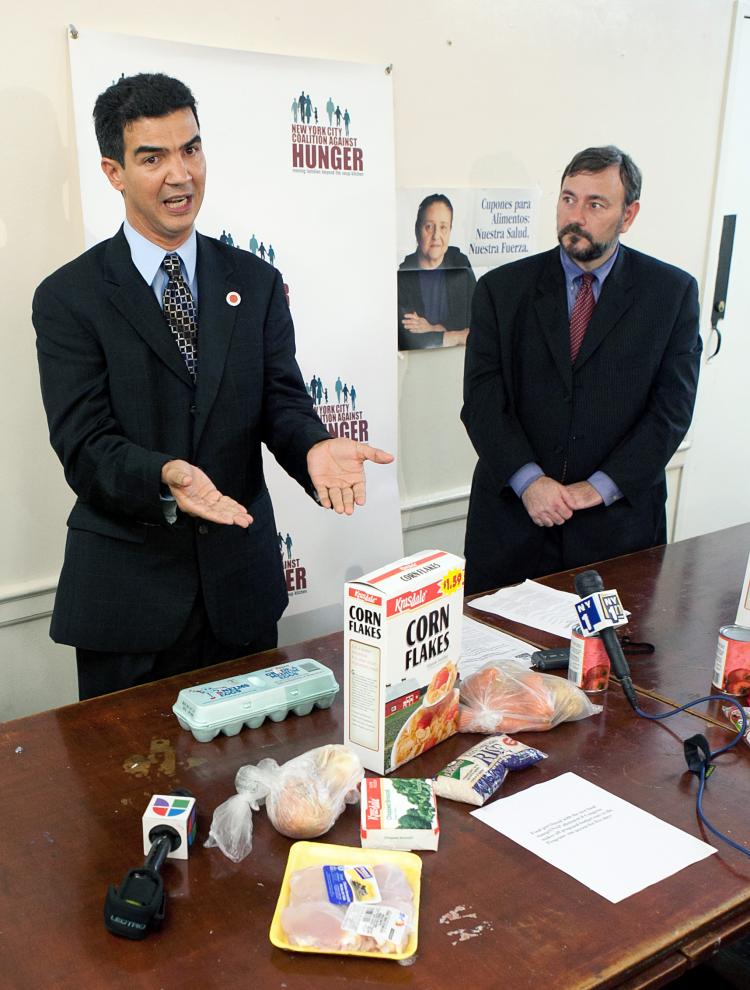 DISPARITY: Council Member Ydanis Rodriguez (L) and Joel Berg, executive director of the Coalition Against Hunger, discussed economic disparity in New York City at a press briefing in Washington Heights on Tuesday.  (The Epoch Times)