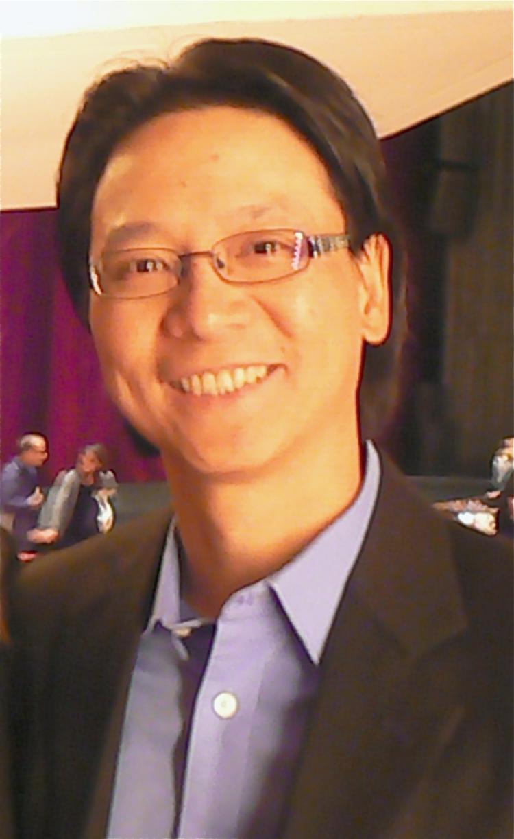 Kin Choi, a senior government manager, enjoyed the spectacular views and pageantry at the Shen Yun Performing Arts show in Ottawa on Boxing Day.  (Donna He/The Epoch Times)