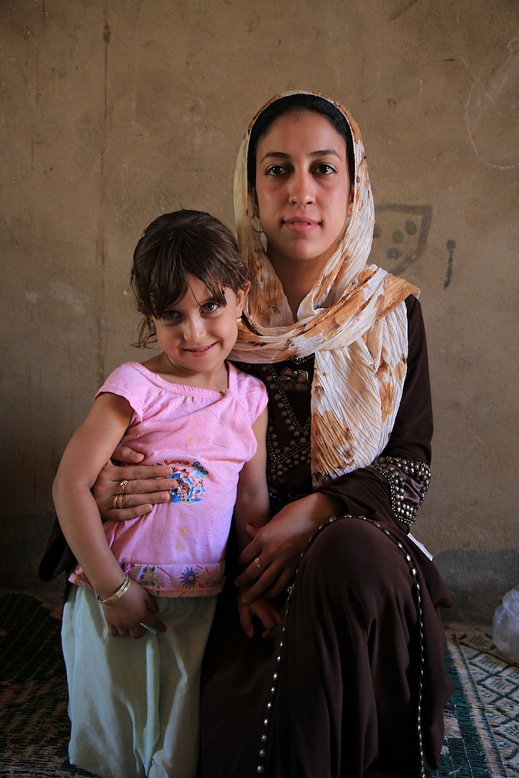 'Egyptian Portrait--Two Sisters' and some 200 other portraits by Israeli photographer Yasmin show the face of the protests in Egypt and Israel earlier this year. (Yaira Yasmin/The Epoch Times)