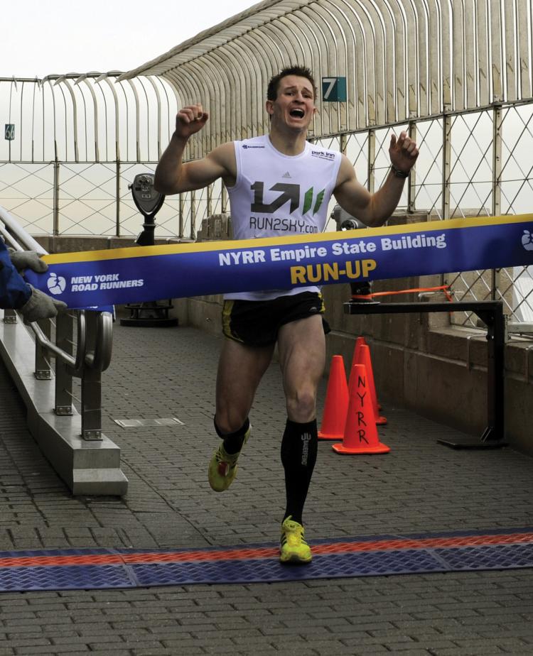 DASH TO THE TOP: Thomas Dold, 25, from Germany, won the Empire State Building Run Up on Tuesday for his fifth consecutive year. Dold's time was 10:16. The 33rd annual run to the 86th floor of the building was sponsored by the New York Road Runners.  (Timothy A. Clary/AFP/Getty Images)