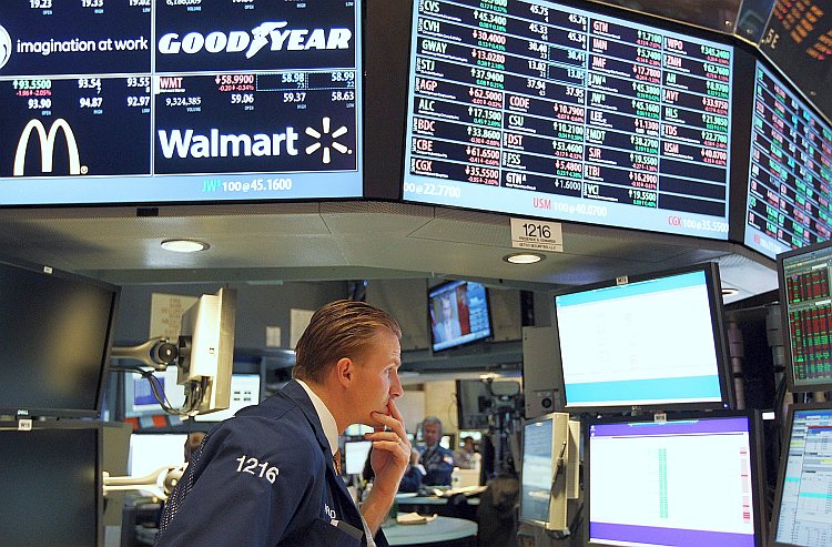 A trader works on the floor of the New York Stock Exchange