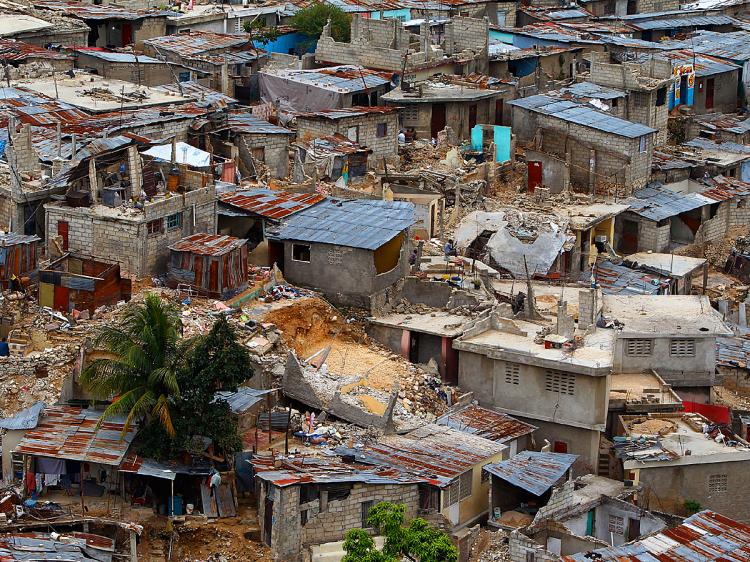 Standing and collapsed homes cover the hillside in the Le Vallee de Bourdon neighborhood in Port-au-Prince, Haiti, February 18, 2010 More than a month after the 7.0 earthquake that destroyed much of Port-au-Prince hundreds of thousands of people are livin (Chip Somodevilla/Getty Images)