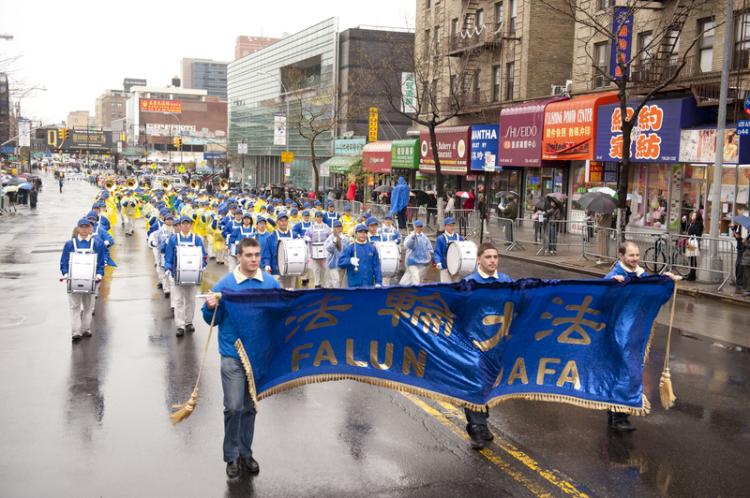 Falun Gong practitioners and China Democracy advocates participated in a parade in Flushing, Queens, on Saturday.  (Edward Dai/The Epoch Times)