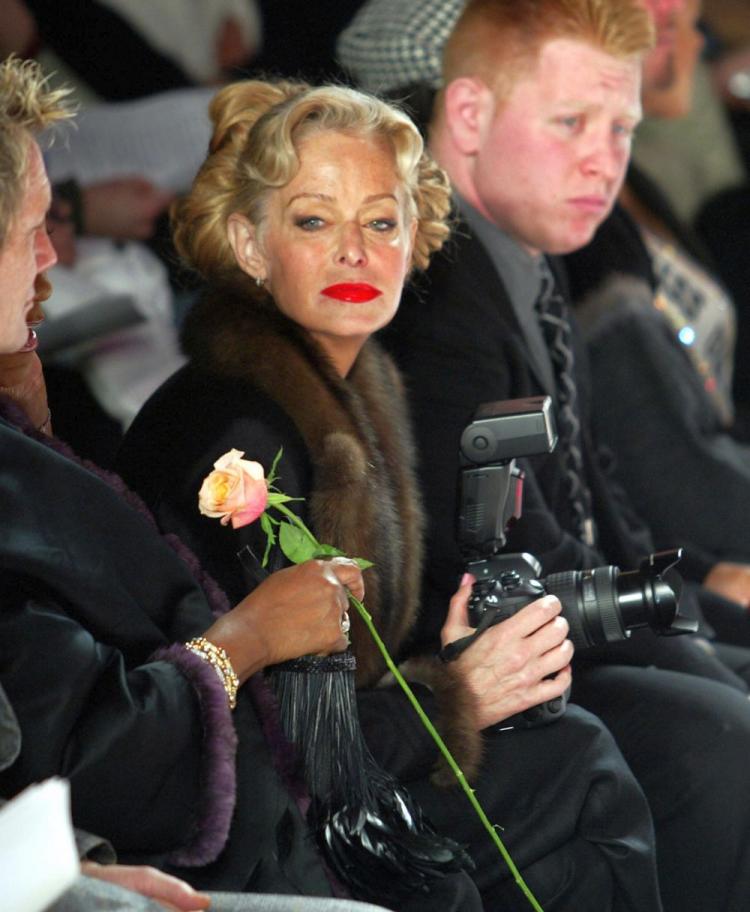 TV icon Farrah Fawcett died Thursday. The above photo of her was taken in 2004 as she watched a fashion show in Bryant Park, New York. (Timothy A. Clary/AFP/Getty Images)