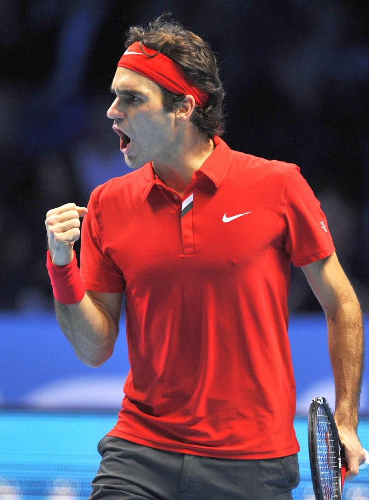 Roger Federer went undefeate 3-0 with his straight-set victory over Robin Soderling on Thursday at the ATP World Tour Finals. (Glyn Kirk/AFP/Getty Images)