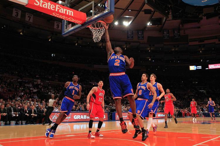 EASY TWO: Raymond Felton scores on an uncontested layup against the Atlanta Hawks on Wednesday night. Felton had a double-double in the Knicks' win. (Chris Trotman/Getty Images)