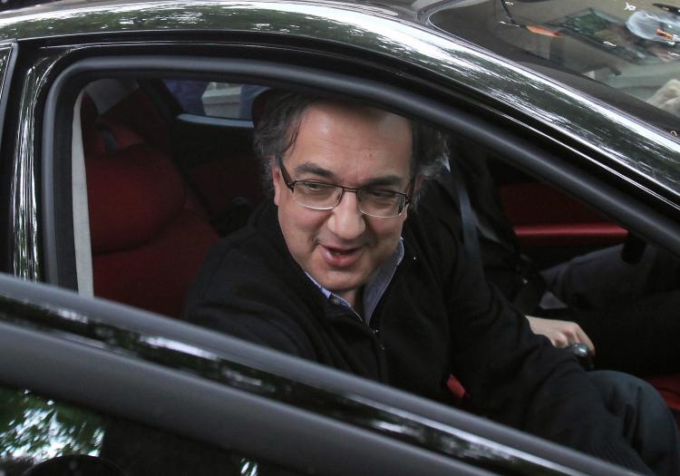 Fiat CEO Sergio Marchionne leaves following talks with Rhineland-Palatinate's state premier Kurt Beck (not in picture) about the future of troubled German carmaker Opel in early May in Mainz, western Germany. (Torsten Silz/AFP/Getty Images)